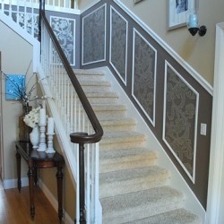 Staircase, paneling, colors. Now this is a hallway!