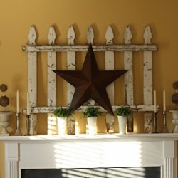 Creative use of a white picket fence and big barn star.