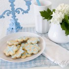 Pretty vignette with cookies and a blue candle stick