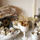 craft room display with lace, doilies and ribbons