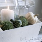 Fall mantel decoration with green and white pumpkins