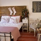 Christmas decorating in bedroom with stockings