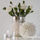 decoration with white flowers in tin can