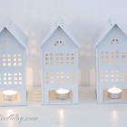 candles lanterns shaped as houses via Songbirdblog