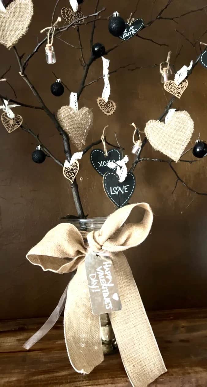 Valentines branch with homemade rustic hearts