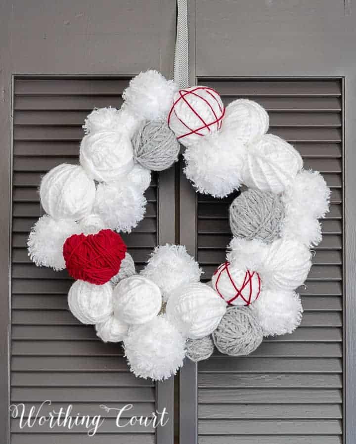 Valentines wreath made with yarn wrapped balls