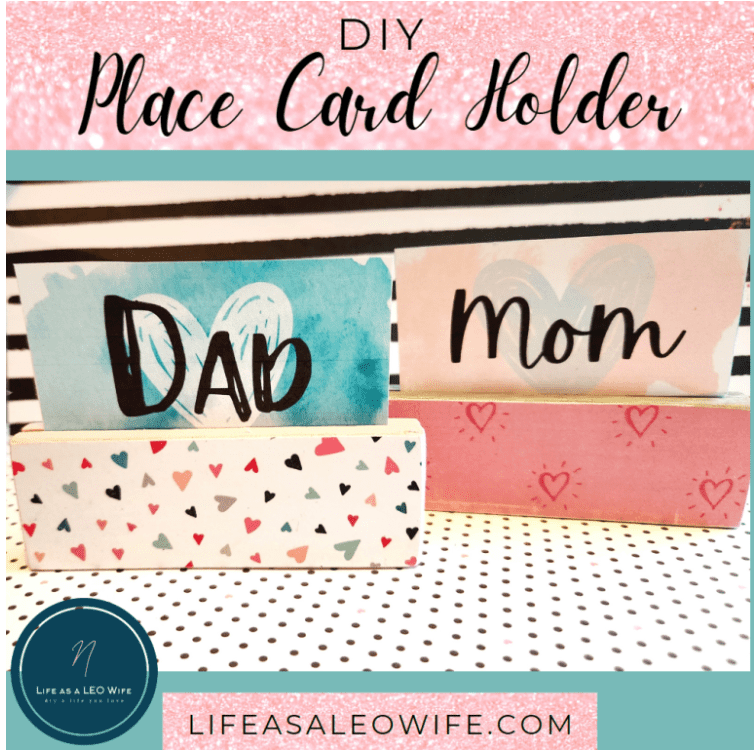 colorful wooden place card holders with heart motive