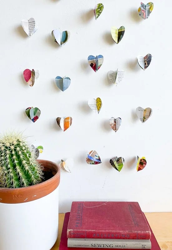 wall decoration for Valentines day with paper hearts garland made from magazines
