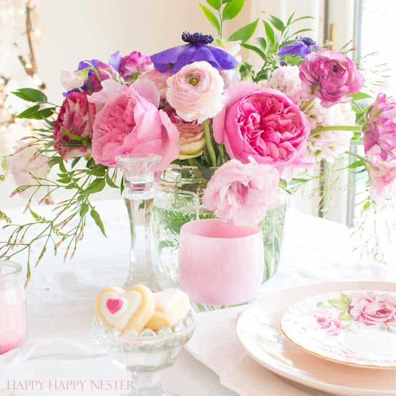 Valentine's Day table setting with pink flowers