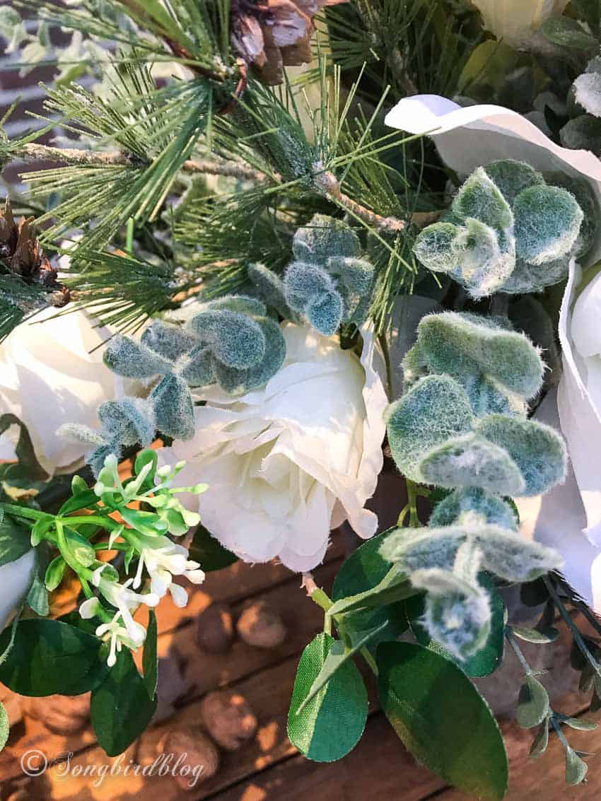 winter floral arrangement with faux flowers